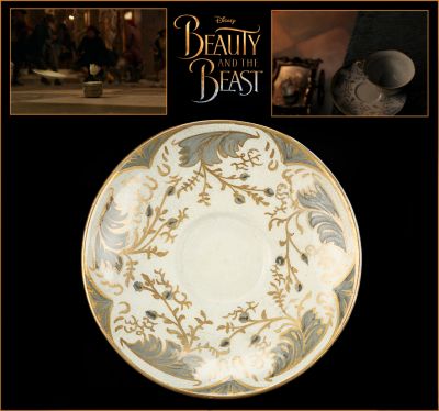 Chip's Saucer
Beauty and the Beast is a fairy tale about a monstrous-looking prince and a young woman who fall in love. From the 2017 Walt Disney live-action reimagining of Disney's 1991 animated film of the same name, this is Chipâ€™s (Nathan Mack) hero Saucer used in the scene when the villagers arrive at the Beastâ€™s Castle and begin to attack. Chip is Mrs. Potts' plucky son who has been transformed into a teacup and the saucer can be seen when Gaston rallies the villagers to follow him to the castle to slay the Beast before he curses the whole village.
Keywords: Chip's Saucer