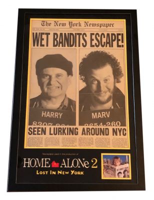 Wet Bandits Escape Newspaper
An original prop created for the production of Home Alone 2: Lost in New York, the 1992 comedy sequel starring Macaulay Culkin. This prop New York Newspaper cover was custom made by the production and features imagery of Harry (Joe Pesci) and Marv's (Daniel Stern) police mugshots. In the movie a different paper is used to set the scene that the duo have escaped while the family are still in Chicago however this design of newspaper did inspire the one held by Kevin (Macaulay Culkin) on the famous poster which was partially computer generated and used extensively during promotion becoming arguably the most famous image associated with the movie. The prop newspaper cover features the mugshots of the two characters with the headline â€œWET BANDITS ESCAPE!â€ and unrelated text below and to the back page, this being altered on the poster to include an image of the Statue of Liberty in aftershave pose in a nod to the first movie, this too obvious to include on a prop intended to be used on screen.
Keywords: Wet Bandits Escape Newspaper