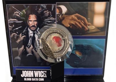 Blood Oath Marker
After returning to the criminal underworld to repay a debt, John Wick discovers that a large bounty has been put on his life. From the 2017 action film John Wick: Chapter 2, this is one of the Blood Oath Markerâ€™s seen and used in the film. Playing a huge piece of the puzzle in the John Wick films, opening the marker reveals a divided surface which indicates the debt of a blood oath between two individuals. The debtor presses a bloody thumbprint on one side to commit an oath is owed while the debtee likewise, presses their bloody thumb on the other side to indicate when an oath has been fulfilled. Issuance and Redemption Records of blood oaths in the film are registered and tracked by The Continental under the supervision of Winston. 
Keywords: Blood Oath Marker