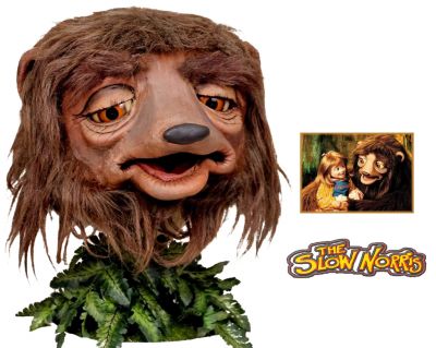 Slow Norris Mask
The Slow Norris is a British children's television program that aired from 4 September 1995 to 23 December 1999. The program portrayed moral tales and fables through various anthropomorphized creatures. There was also a version produced for American television by Hollywood Ventures which ran on PBS in the fall of 1997. This is the lead character â€œSlow Norrisâ€™â€ costume mask worn throughout the series. Slow Norris is a large, hairy Slow loris-like creature who although not very clever (and somewhat naive) is willing to learn and participate in stories and activities. 
Keywords: Slow Norris Mask
