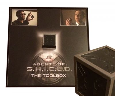 The Toolbox
Following the discovery of a vast infiltration of HYDRA sleeper agents among S.H.I.E.L.D.'s ranks, Director Nick Fury went into hiding, where he eventually encountered Agent Phil Coulson and his Team. Due to his trust and respect for Coulson as one of his former top agents, Fury appointed Coulson as the new Director of S.H.I.E.L.D. and gave him the Toolbox to help him gather the remnants of S.H.I.E.L.D. and rebuild it from the ground up. The Toolbox gave Coulson the coordinates of the Playground, which Coulson made his new headquarters. As Director of S.H.I.E.L.D. Coulson regularly consulted the files in the Toolbox, keeping it stored in a secret compartment in his desk. The device continued to prove a valuable asset, giving Coulson information on potential resources and personnel as he continued to rebuild. Along with the Toolbox holding priceless information, when S.H.I.E.L.D. became caught up in HYDRA's hunt for a decades old artifact that S.H.I.E.L.D. had recently lost, the Toolbox provided files from the Strategic Scientific Reserve revealing the object was the first 0-8-4, an Obelisk that Peggy Carter confiscated in 1945. This is the screen used Toolbox used in the TV series Agents of S.H.I.E.L.D.; and shows obvious use from filming and plays a vital part in multiple episodes.
Keywords: The Toolbox