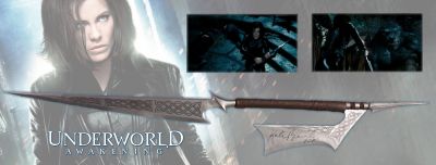 Selene's Hero Double Bladed Axe
â€œThis is a new war and itâ€™s only the beginning.â€- Selene. The Underworld is threatened when mankind discovers the existence of the Vampire and Lycan species that have been thriving in this â€œalternate universeâ€. This situation isnâ€™t good for them since mankind has begun a war to literally wipe both species off the face of the earth, like rats during the â€œBlack Plagueâ€ years of 14th century Europe. Instead of the Vampires and Lycans banding together against humankind, itâ€™s the â€œdivide and conquerâ€ mentality as they both go after each other as well as their common enemy. From Underworld: Awakening, this is Selene's (Kate Beckinsale) screen used, hero metal double bladed axe. Besides being the only hero metal version used in the film and obtained directly off set, it also includes etched handles with the metal also being etched with designs. The axe was used on set by Kate during filming, signed directly after, then handed to the crew member.
Keywords: Selene's Hero Double Bladed Axe