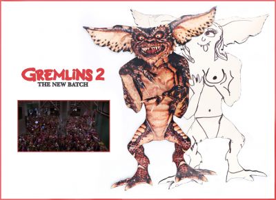Brain Gremlin Cutout
A Brain Gremlin cutout from Joe Dante's 1990 comedic horror sequel Gremlins 2: The New Batch. Cutouts like this were made for use as a background Gremlin in heavily populated crowd scenes. The cutout is made of foam core and is painted black around the edges. This particular cutout features a crew joke on the hand-drawn on the back of the piece, which depicts a nude female Gremlin. 
Keywords: Brain Gremlin Cutout