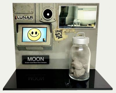 Jar of Moon Rocks
Astronaut Sam Bell has a quintessentially personal encounter toward the end of his three-year stint on the Moon, where he, working alongside his computer, GERTY, sends back to Earth parcels of a resource that has helped diminish our planet's power problems. From the 2009 film these are sample moon rocks inside their glass jar and seen many times throughout the film.
Keywords: Jar of Moon Rocks