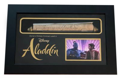 Genie's (Will Smith) Contract
A kind-hearted street urchin and a power-hungry Grand Vizier vie for a magic lamp that has the power to make their deepest wishes come true. From the 2019 live action Disney film Aladdin, this is the Contract describing the rules for the three wishes the owner of the lamp receives. This prop can be seen when the Genie (Will Smith) hands the scroll to Aladdin (Mena Massoud) as they both sit on a sofa during the Song â€œFriend Like Meâ€, when he is singing about the details and agreement between Aladdin and the Genie. 
Keywords: Genie's (Will Smith) Contract